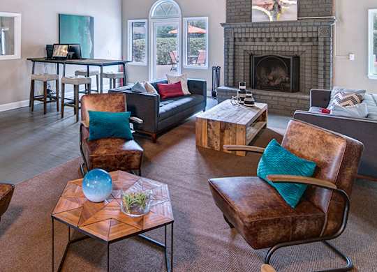 A living room with a fireplace and a couch.