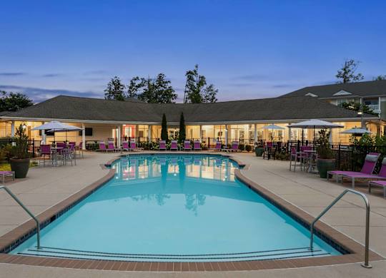 Resort style swimming pool at dusk at Colony at Centerpointe Apartments, Midlothian, VA