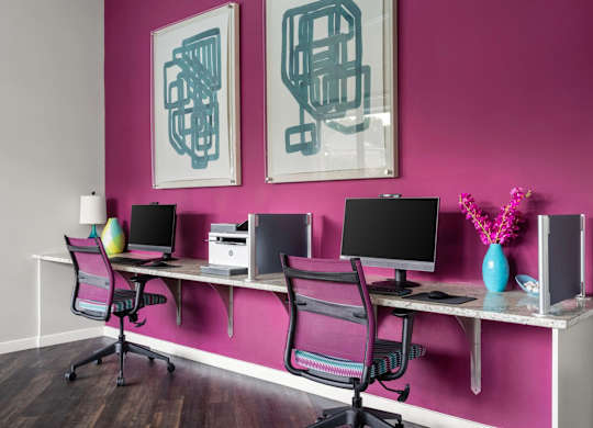 Home office workspace with dual monitor setup at Colony at Centerpointe Apartments, Midlothian, Virginia