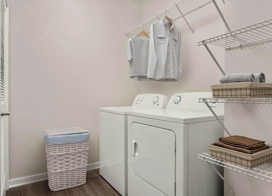 Laundry room with washer and dryer at Colony at Centerpointe Apartments, Midlothian
