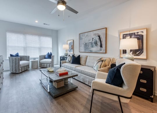 a living room with furniture and a ceiling fan at Retreat at Arden Farms, Arden, NC