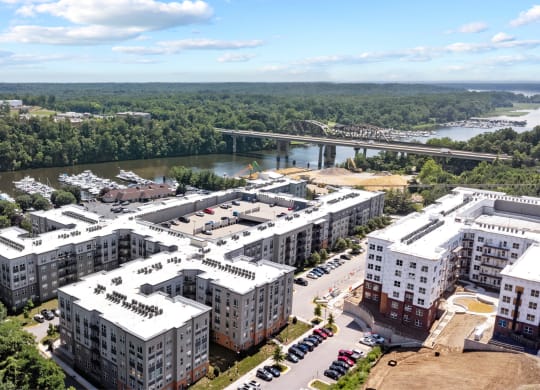 an aerial view of the campus with a bridge in the background at Rivergate, Woodbridge