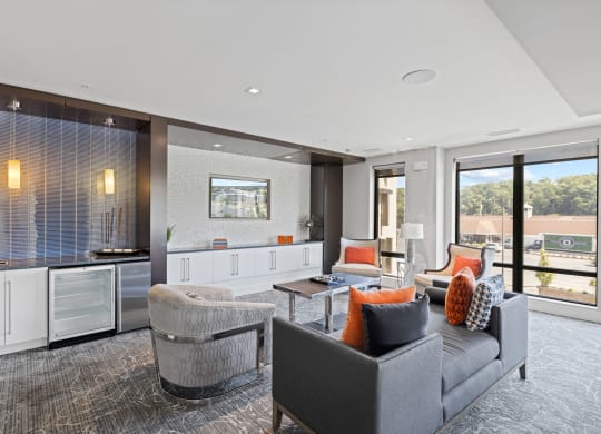 a living room filled with furniture and a large window at Rivergate, Virginia