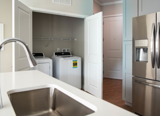 a kitchen with stainless steel appliances and a sink at One Riverside Apartments, Chattanooga, TN, 37403