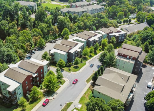 an aerial view of a neighborhood with houses and trees at Skyloft, Asheville, 28803