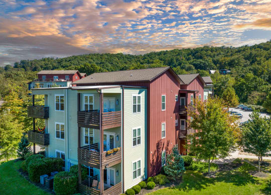 an aerial view of a building with a mountain in the background at Skyloft, North Carolina