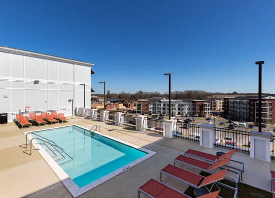 a view of the pool at homewood suites by hilton houston stafford sugar at The Flats at Southlawn Apartments, Lawrenceville, GA