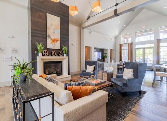 A living room with a fireplace and a couch.