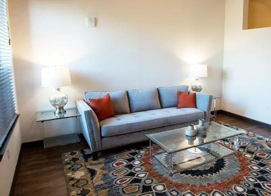 a living room with a couch and a coffee table at 17 Broad, Chattanooga, TN