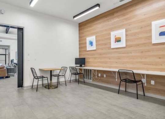 a living room with tables and chairs and a tv at Marina Point, Chattanooga, 37415
