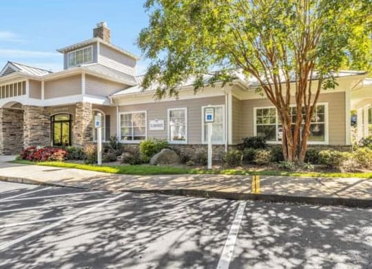 a large house with a tree in front of it at Marina Point, Chattanooga
