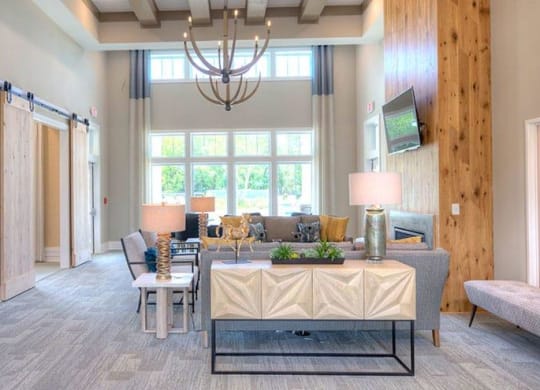 a living room with a couch and a table  at Lullwater at Big Ridge, Hixson, TN, 37343