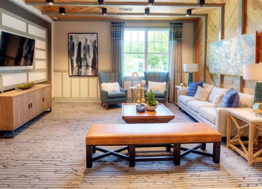 a living room with a couch and a table  at Lullwater at Big Ridge, Hixson, TN