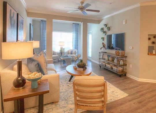 a living room with a couch and a table  at Lullwater at Big Ridge, Hixson, Tennessee