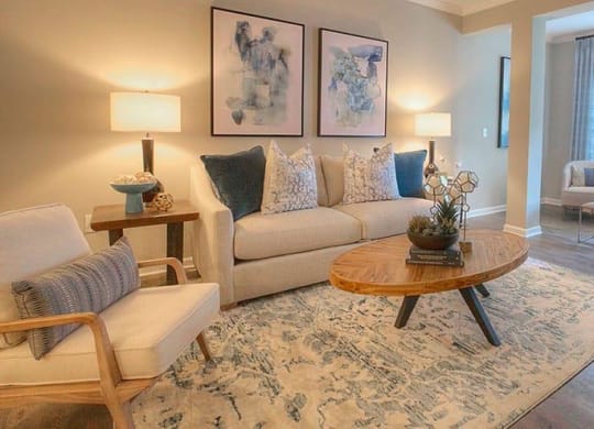 a living room with a couch and a table  at Lullwater at Big Ridge, Hixson, TN