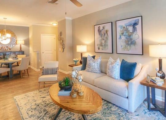 a living room with a couch and a table  at Lullwater at Big Ridge, Hixson, TN, 37343