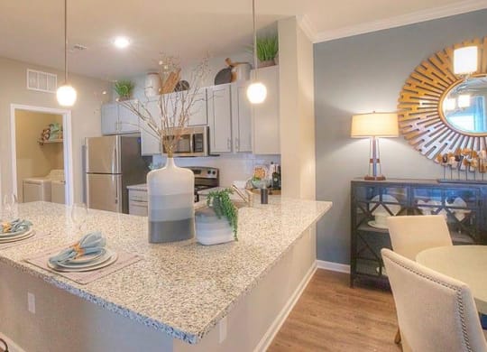 a kitchen with a counter top with plates on it  at Lullwater at Big Ridge, Hixson, Tennessee