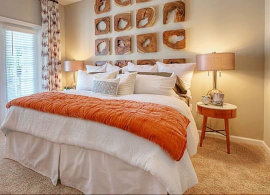 a bedroom with a bed and a large window  at Lullwater at Big Ridge, Tennessee, 37343