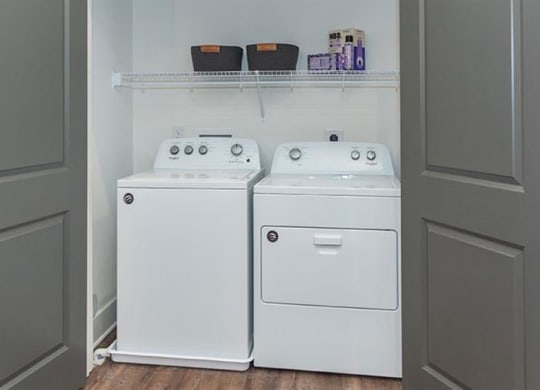 a white washer and dryer in a room at Livingston Flats Apartments, Chesterfield, Virginia