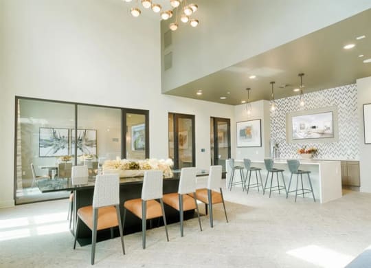 a dining room with a long table and chairs at Artistry at Winterfield Apartments, Virginia,23112