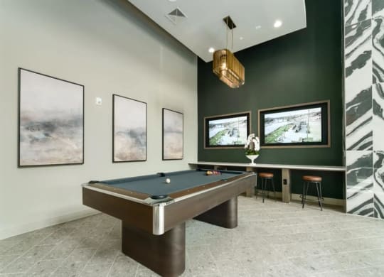a pool table  at Artistry at Winterfield Apartments, Virginia