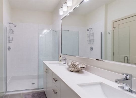 Glass encased showers at 2000 West Creek Apartments, Virginia, 23238