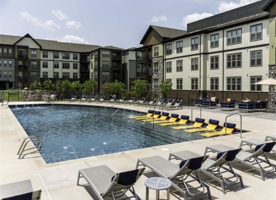Sundeck with loungers at 2000 West Creek Apartments, Virginia, 23238