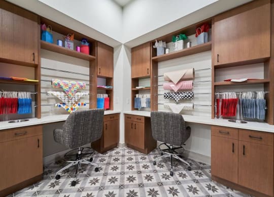 a room with two desks and two chairs at Tapestry West, VA 23230