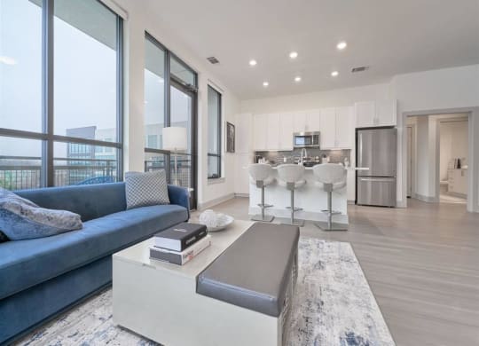 a living room with a couch and a coffee table at Tapestry West, Virginia, 23230