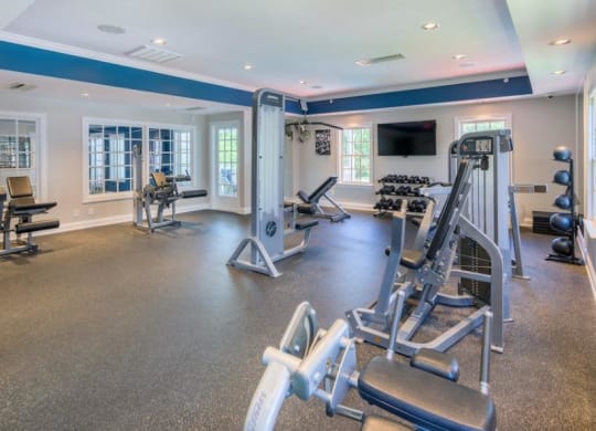 a gym with a lot of exercise equipment in it at Sterling Manor, Williamsburg Virginia