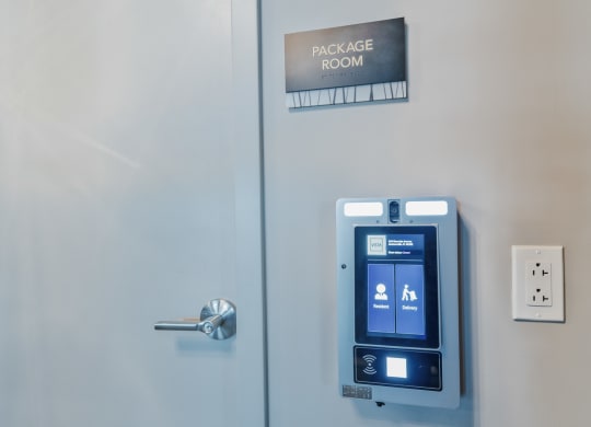 the door to the passage room with a door automation system on it at Vista Brooklynn Apartments, Jacksonville, FL, 32202