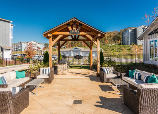 the outdoor patio of a home with chairs and a gazebo at Village at Westland Cove Apartments, Knoxville, 37922