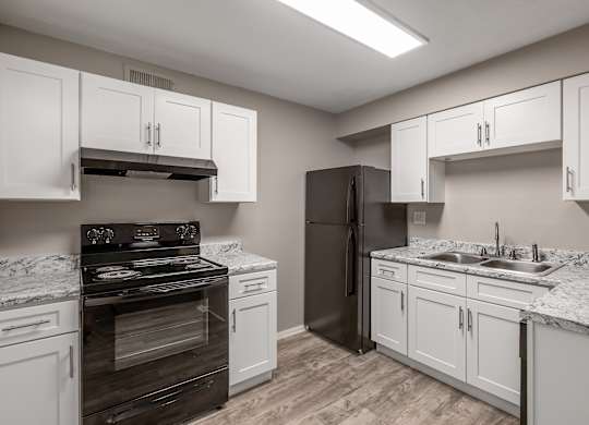 White Kitchen Cabinets at Lifestyle at Shreveport Apartments, Shreveport, LA, 71109