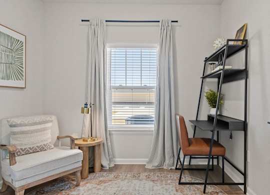 A room with a chair, a table, a window with curtains, and a shelf with a plant.