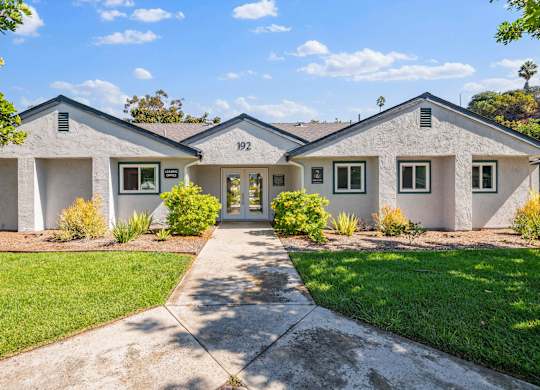 A house with the number 192 on the front.