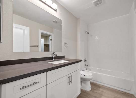 Bathroom With Bathtub at Sunset Cliffs Apartments, Vista, CA