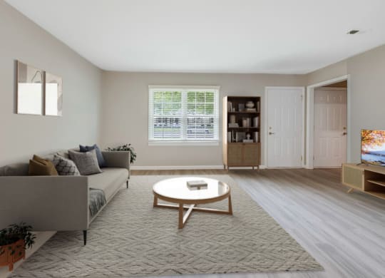 a living room with a couch and a coffee table