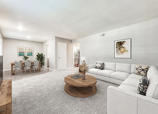 Bright living area with sectional sofa at Northwood Heights Apartments, Dallas
