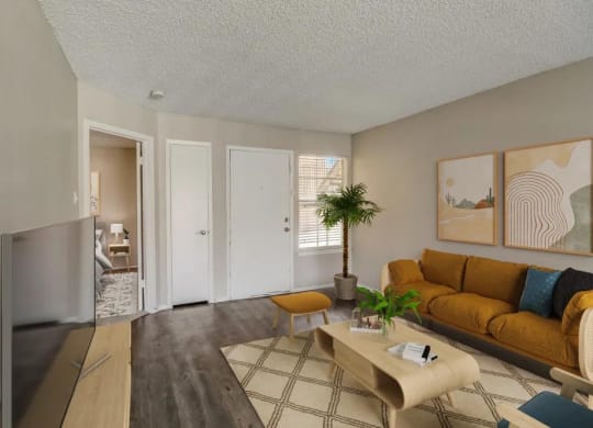a living room with a couch and a table