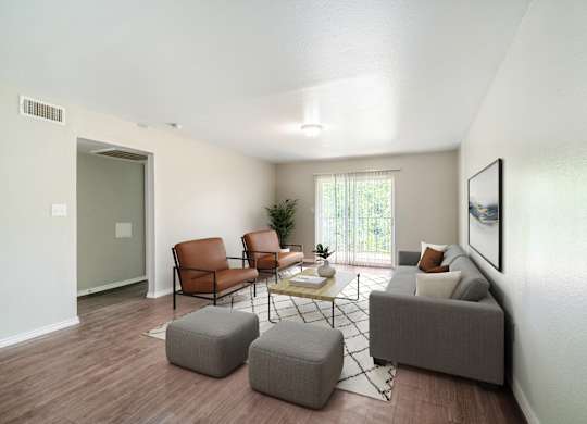 Spacious living room with contemporary furniture at Lumina Apartments, Texas