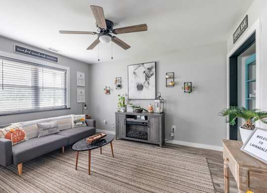 Living Room With Ceiling Fan at Lauradale, Jacksonville, NC 28540