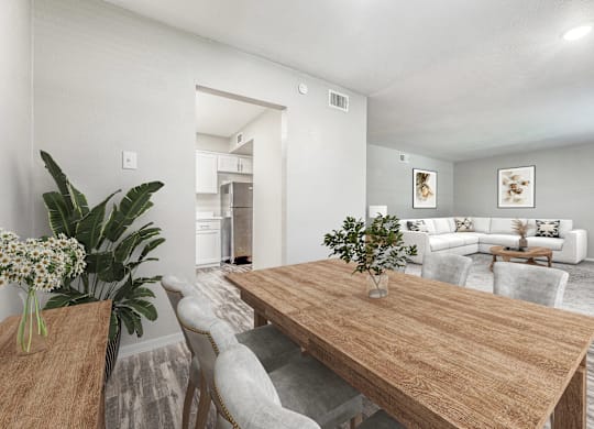Open dining area with wood tone table at Northwood Heights Apartments, Dallas