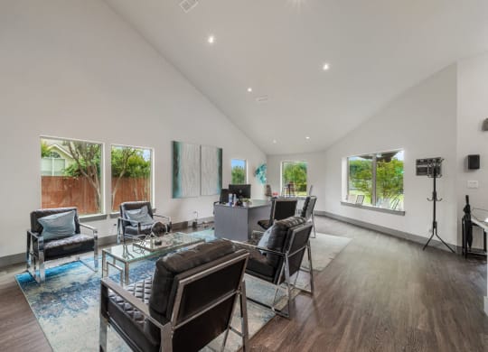 a living room with couches and chairs and a table  at Shadow Ridge, Arlington, 76013