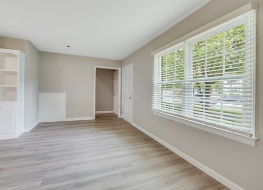 cameron apartments living room with bright large windows in wilson nc