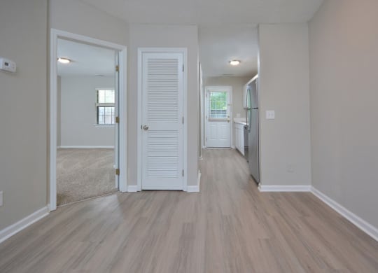 apartment living room to kitchen at Bennett, Greenville, North Carolina