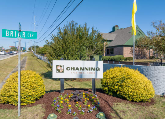 the building where the apartments are located is next to a street