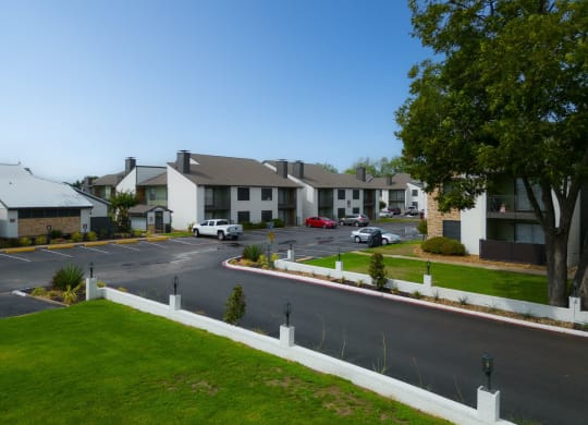 a view of a street in a neighborhood with houses