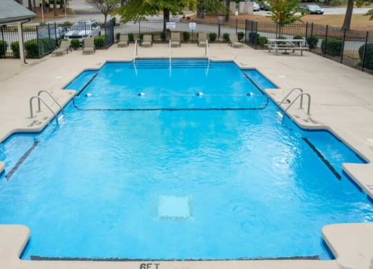 a large pool with blue water in a hotel pool  at Henley, North Carolina