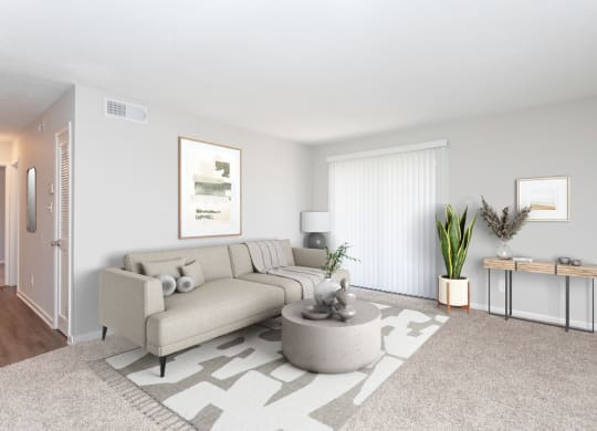 a living room with a couch and a coffee table