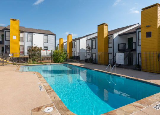 our apartments have a large swimming pool in front of our buildings at Helios, Dallas, 75240